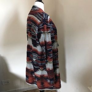 Nearly new, cardigan with southwest motif.